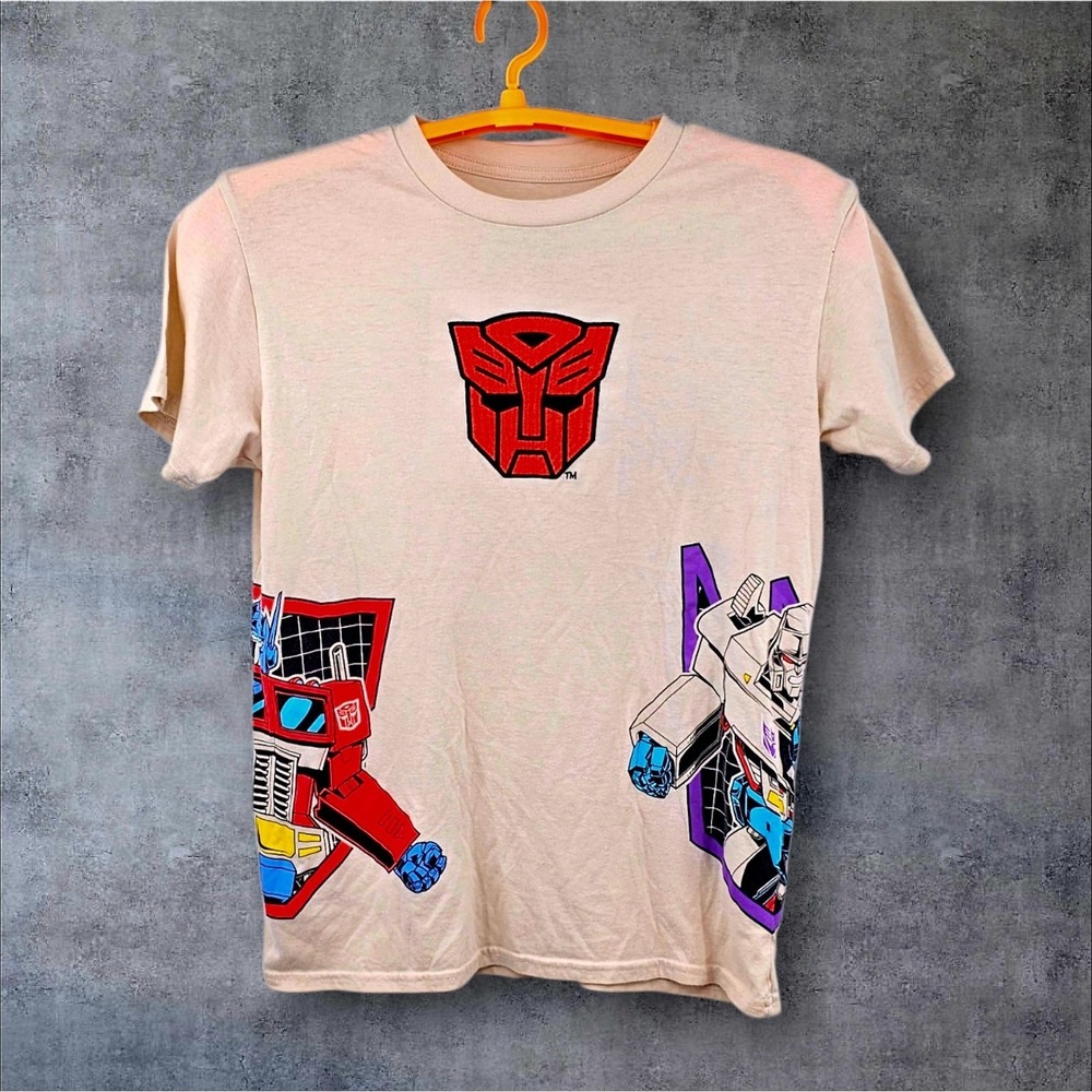 Transformers Hasbro AOP Graphic T-Shirt‎ Large Cream Optimus Prime Megatron